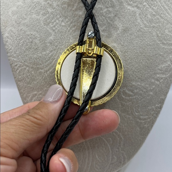 Black and Gold Bolo Tie with Circular Pendant with Star Center Black Braided - Picture 5 of 16